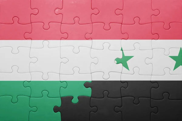 Puzzel met de nationale vlag van Hongarije en Syrië — Stockfoto