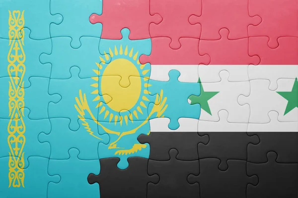 Puzzle con la bandiera nazionale del kazakhstan e della Siria — Foto Stock