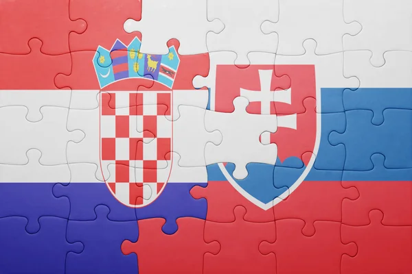 Quebra-cabeça com a bandeira nacional da Eslováquia e da croácia — Fotografia de Stock
