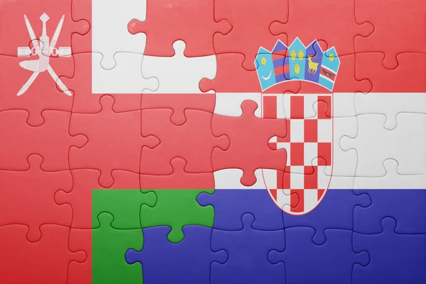 Quebra-cabeça com a bandeira nacional de oman e croácia — Fotografia de Stock