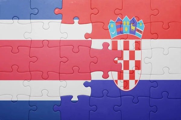 Quebra-cabeça com a bandeira nacional da costa rica e croácia — Fotografia de Stock