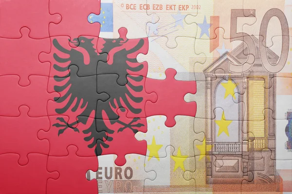 Puzzle with the national flag of albania and euro banknote — Stock Photo, Image