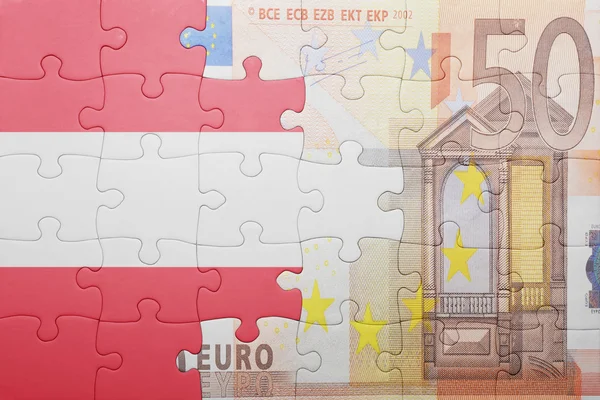 Puzzle with the national flag of austria and euro banknote — Stock Photo, Image