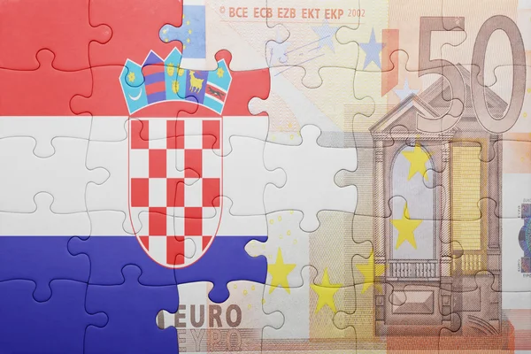 Puzzle z Flaga narodowa Chorwacji i euro banknot — Zdjęcie stockowe