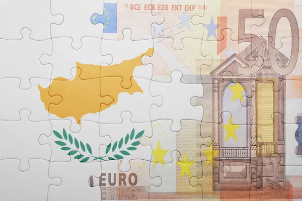 Puzzle with the national flag of cyprus and euro banknote — Stock Photo, Image