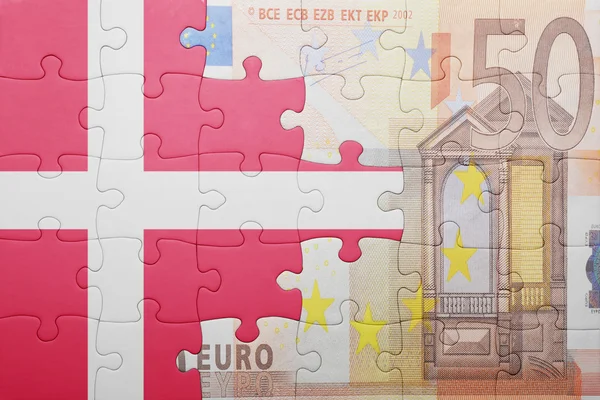 Puzzle with the national flag of denmark and euro banknote — Stock Photo, Image