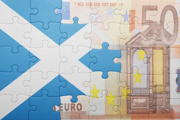 Puzzle with the national flag of scotland and euro banknote — Stock Photo, Image