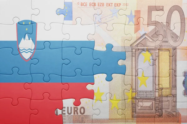 Puzzle s národní vlajka Slovinska a euro bankovek — Stock fotografie