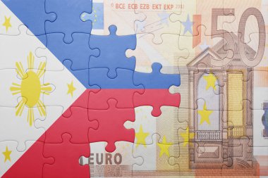 Bulmaca bayrağı Filipinler ve euro ile banknot