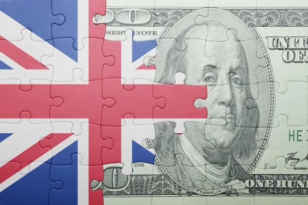 Puzzle with the national flag of great britain and dollar banknote — Stock Photo, Image