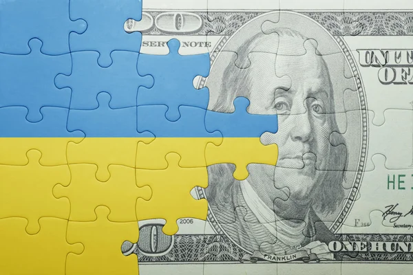 益智与乌克兰和美元钞票的国旗 — 图库照片