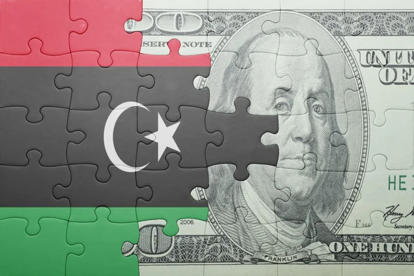 リビアとドル紙幣の国旗をパズルします。 — ストック写真