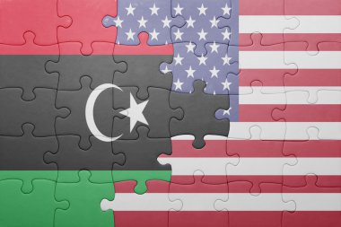 puzzle with the national flag of united states of america and libya 