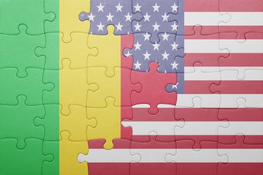 puzzle with the national flag of united states of america and mali 