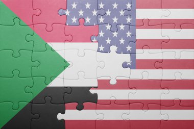 puzzle with the national flag of united states of america and  sudan