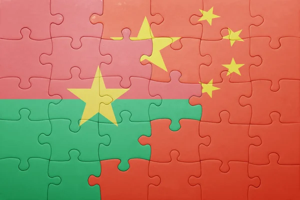 中国とブルキナファソの国旗をパズルします。 — ストック写真