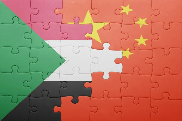 Çin ve sudan bayrağı ile bulmaca — Stok fotoğraf