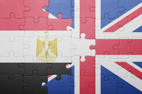 Пазл з національним прапором Великої Британії та Єгипту — стокове фото