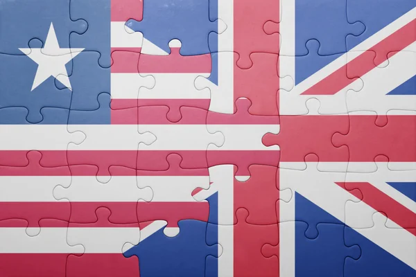 Rompecabezas con la bandera nacional de Gran Bretaña y Liberia — Foto de Stock