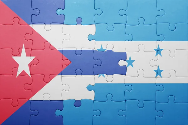 Puzzle mit der Nationalflagge von Honduras und Kuba — Stockfoto