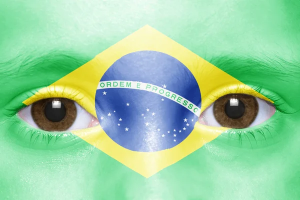 Ανθρώπινο του πρόσωπο με βραζιλιάνικη σημαία — Φωτογραφία Αρχείου