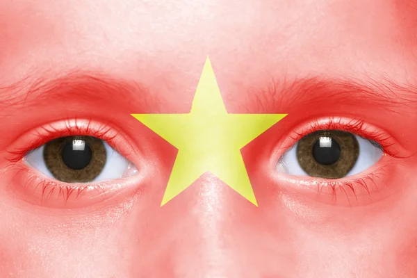 Visage humain avec drapeau vietnamien — Photo