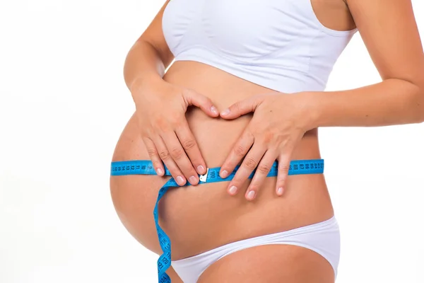 Gebelik. Hamile kadın sağlığı. Ölçüm boyutu karın metre bandı ile — Stok fotoğraf