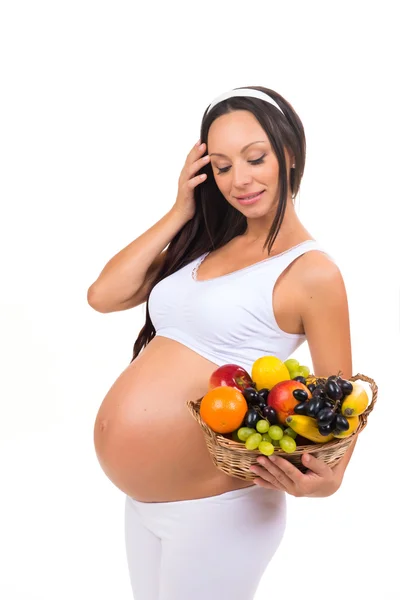 Voeding van zwangere vrouwen. Vitamine fruitmand. Gezondheid, schoonheid, voeding — Stockfoto