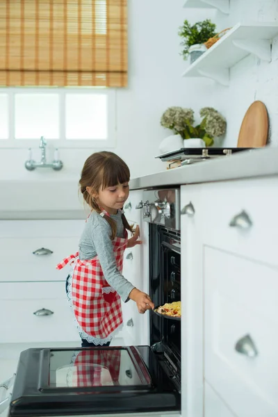 Little Helper Pretty Girl Culinary Apron Prepares Pizza Puts Dough — Stock Photo, Image