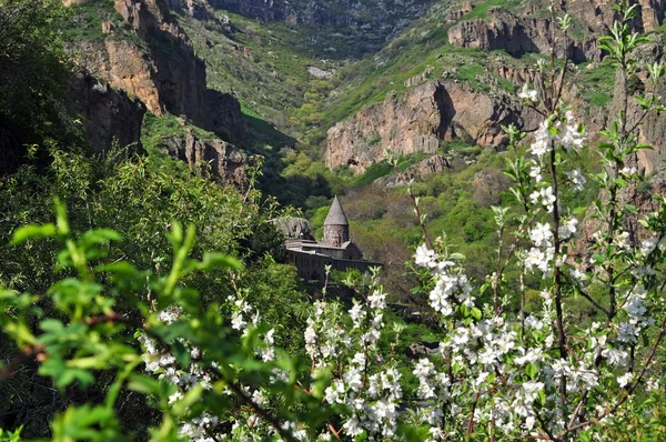 Armenian monastery of Geghard in flowers — Stock Photo, Image