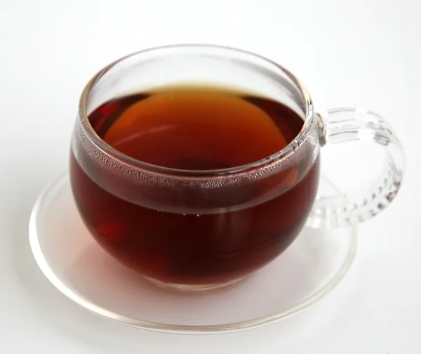 Tasse de thé sur fond blanc — Photo