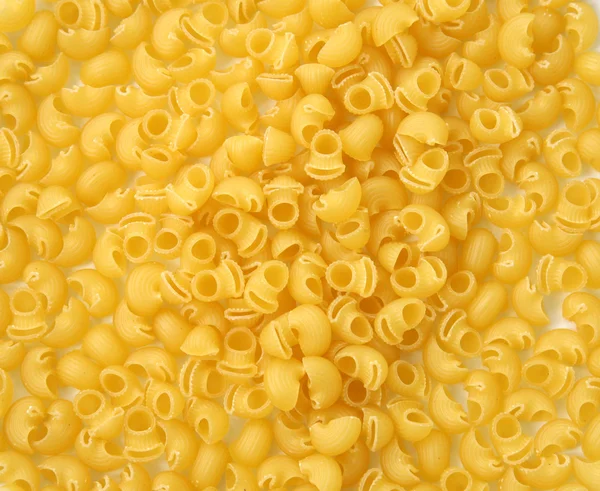 Dry Italian pasta background — Stock Photo, Image