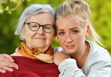 Portrait of grandmother and granddaughter clipart
