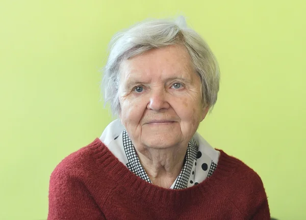 Senior happy woman in her home — Stock Photo, Image