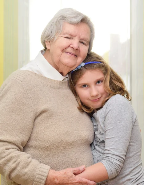 Happy grandmother with granddaughter. — Stock Photo, Image