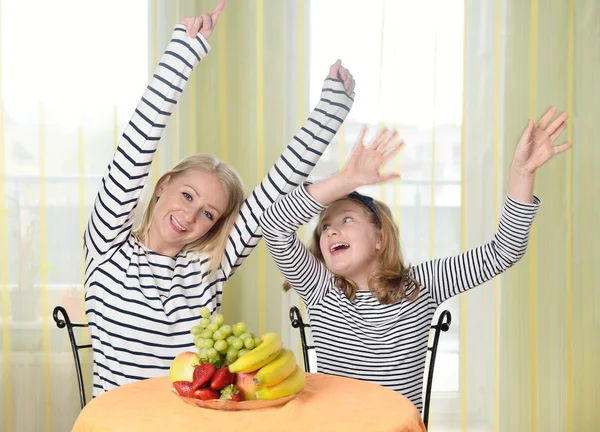 Mother and daughter are playing together Stockbild