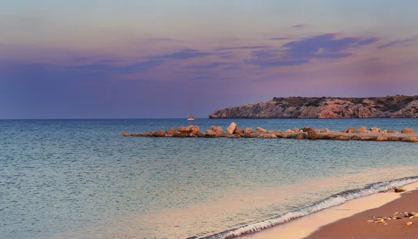 Sunrise over sea with rocks. — Stock Photo, Image