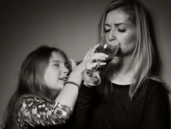 Child asking  mother to  stopp drinking — Stock Photo, Image