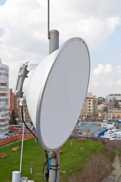 Antenna cellular base station in the city — Stock Photo, Image