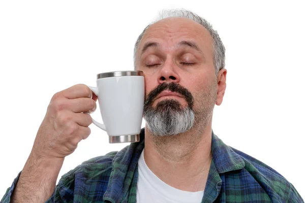 Homem sonolento lutando para beber café — Fotografia de Stock