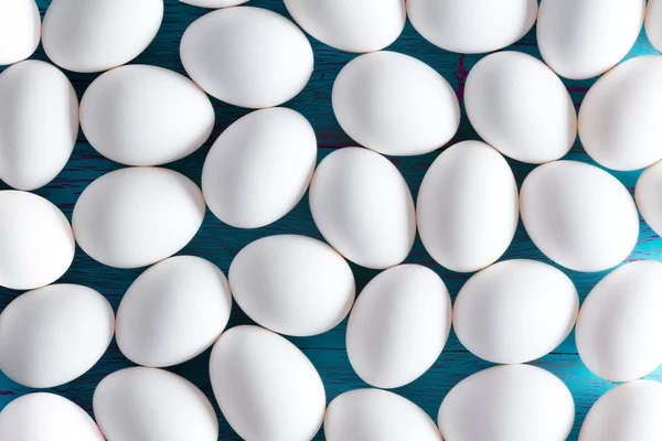 Háttere fehér cukorral bevont húsvéti tojás — Stock Fotó