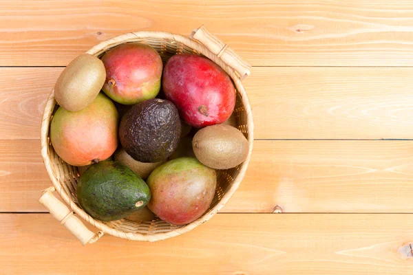 Top down view of tropical fruit basket — Stock Photo, Image