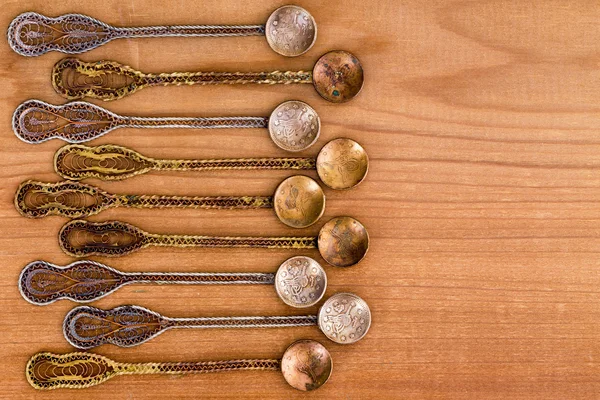 Ornate Ottoman era tea spoons with copy space — Stock Photo, Image