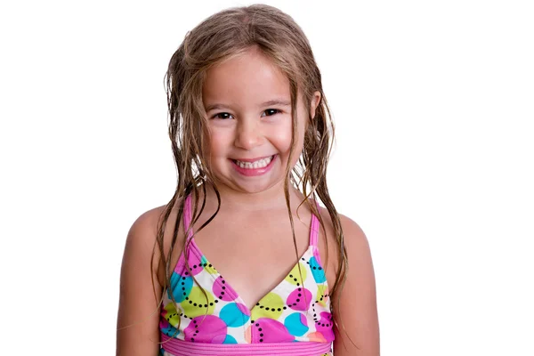 Gelukkig klein meisje met toothy glimlach — Stockfoto