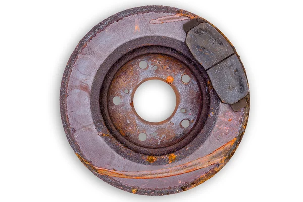 Old scored rusty brake rotor and pads — Stock Photo, Image