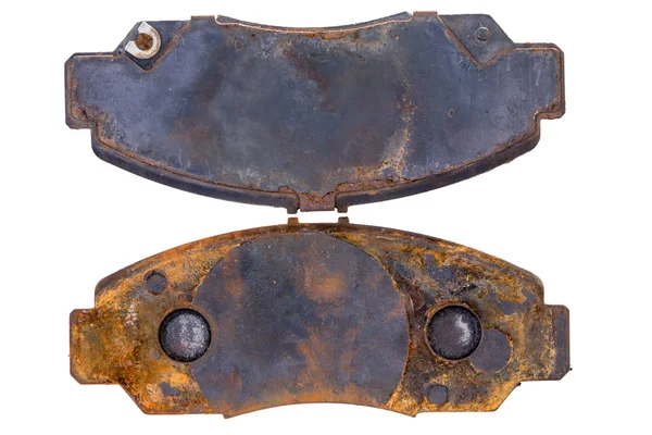 Pair of old rusty worn brake pads — Stock Photo, Image