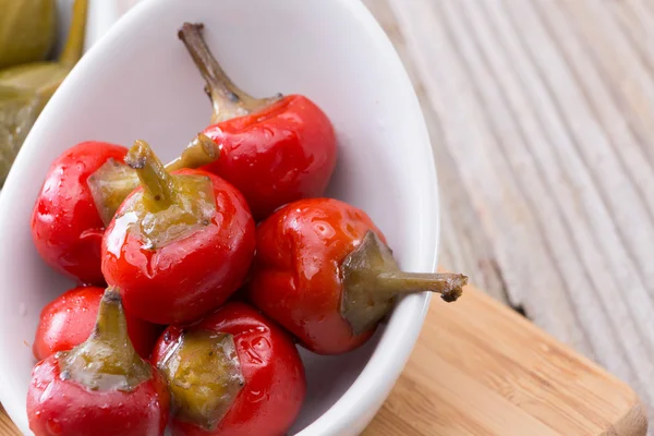 Red Pimento or Cherry Pepper on White Bowl — Stock Photo, Image