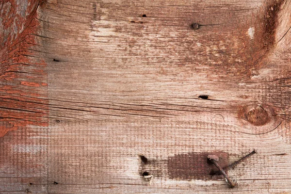 Textura de madeira velha com unhas enferrujadas — Fotografia de Stock