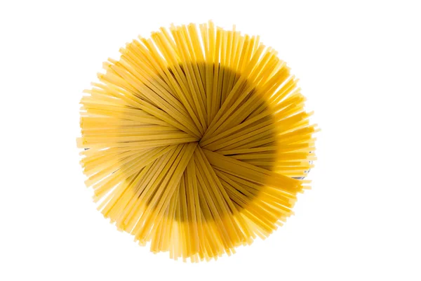 Dried fettuccine arranged in a flower effect — Stock Photo, Image