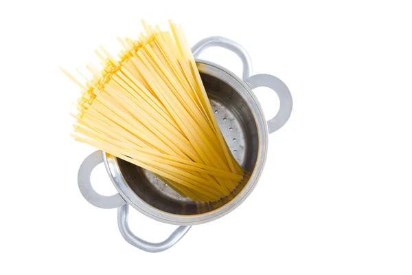 Bundle of dried fettuccine pasta in a pot — Stock Photo, Image
